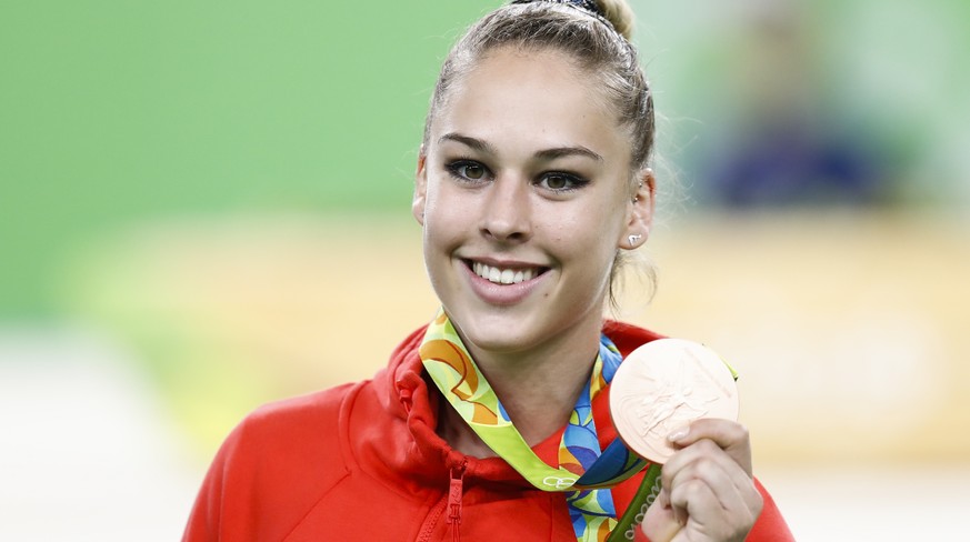 Switzerland&#039;s Giulia Steingruber celebrates with the bronze medal after the women’s Artistic Gymnastics Vault final in the Rio Olympic Arena in Rio de Janeiro, Brazil, at the Rio 2016 Olympic Sum ...