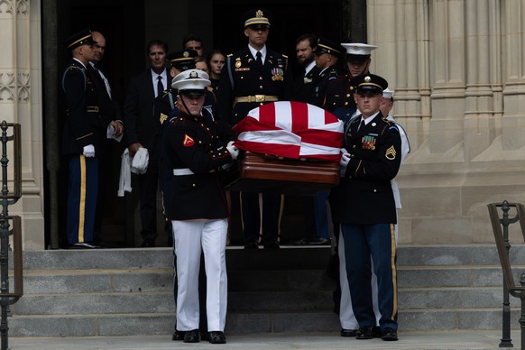 epa13138409 A military honor guard carries the casket of US Senator Lindsey Graham of South Carolina following funeral services at the Washington National Cathedral in Washington, DC, USA, 28 July 202 ...