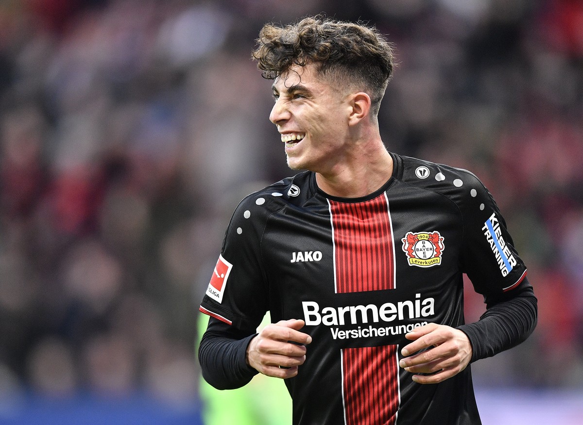 Leverkusen's scorer Kai Havertz, smiles after scoring his side's second goal during the German Bundesliga soccer match between Bayer Leverkusen and Hertha BSC Berlin in Leverkusen, Germany,  ...