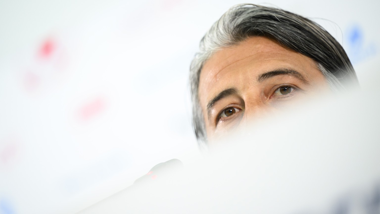 Switzerland&#039;s head coach Murat Yakin speaks during a press conference of the Switzerland&#039;s soccer national team after the elimination of the FIFA World Cup Qatar 2022 by Portugal in the roun ...