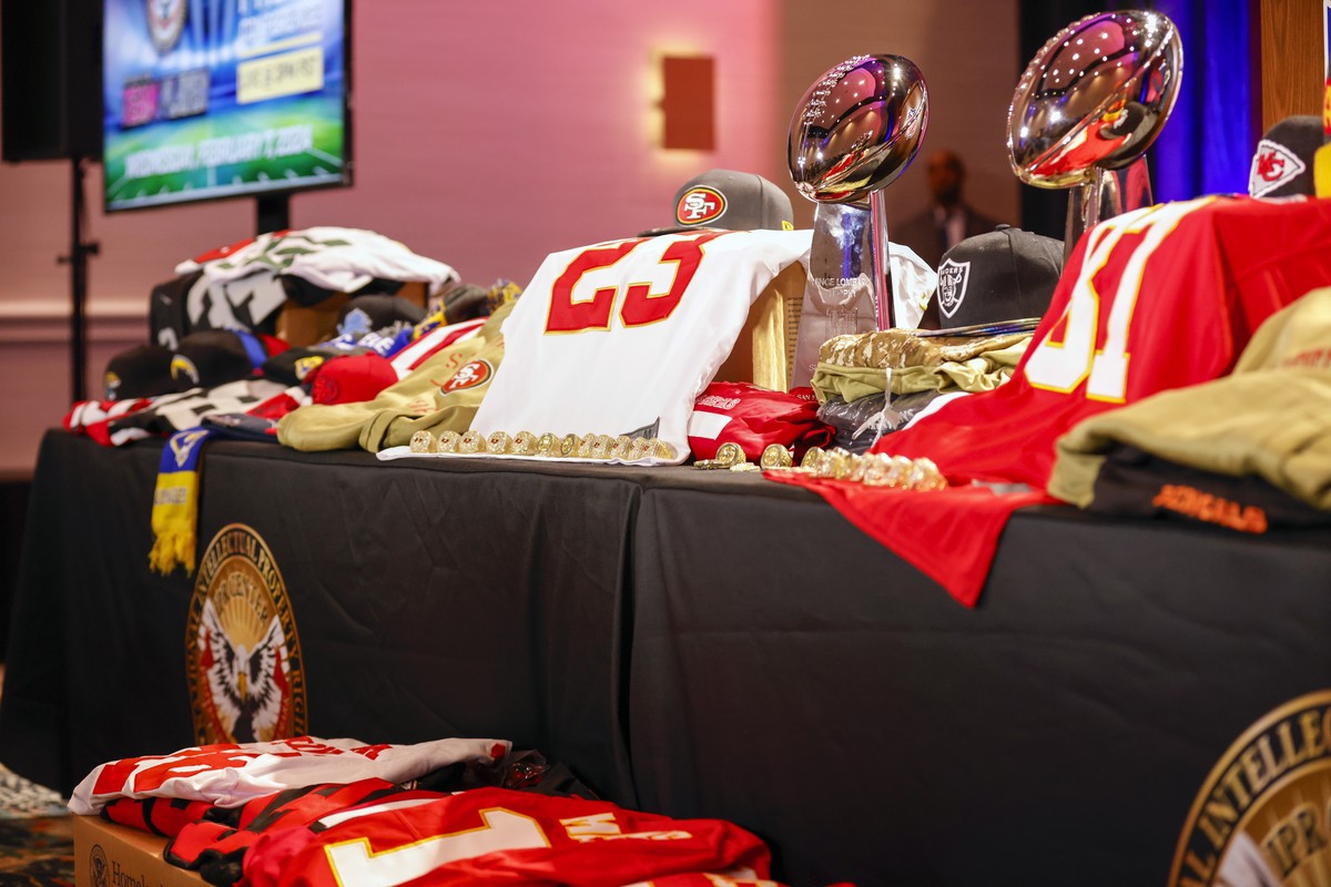 epa11135313 Evidence of counterfeit NFL jerseys, rings, and other items are displayed during an Anti-counterfeiting press conference with The NFL and law enforcement agencies in Las Vegas, Nevada, USA ...