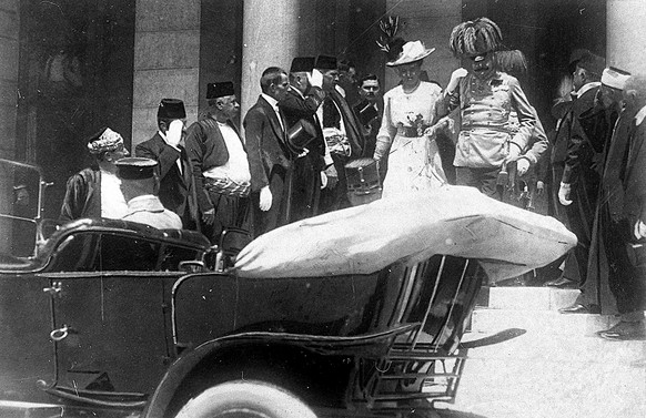 ONE OF ONE HUNDRED PHOTOS WORLD WAR ONE CENTENARY TIMELINE FILE - In this June 28, 1914 file photo, the Archduke of Austria Franz Ferdinand, center right, and his wife Sophie, center left, walk to their a car in Sarajevo. This photo was taken minutes before the assassination of the Archduke and his wife, an event which set off a chain reaction of events which would eventually lead to World War One. (AP Photo, File)