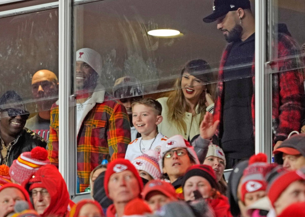 Taylor Swift celebrates in the third quarter as the Kansas City Chiefs defeat the Cincinnati Bengals at Arrowhead Stadium in Kansas City, Missouri on Sunday, December 31, 2023. The Chiefs defeated the ...