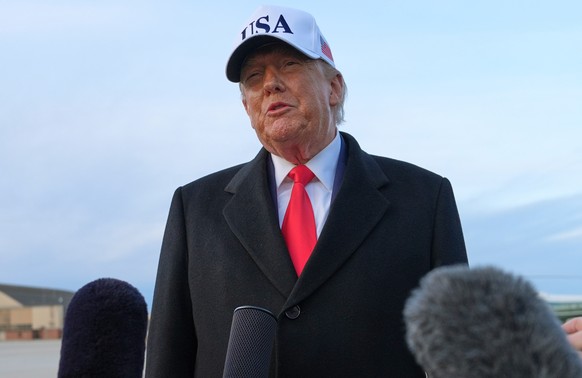 President Donald Trump speaks with reporters at Joint Base Andrews, Tuesday, Jan. 13, 2026, in Joint Base Andrews, Md. (AP Photo/Evan Vucci)
Donald Trump