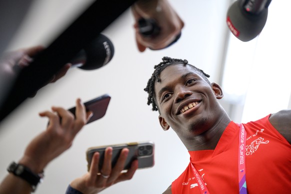 epaselect epa10319736 Switzerland&#039;s forward Breel Embolo speaks to journalists during a mixed zone after a training session of Swiss national soccer team in preparation for the FIFA World Cup Qat ...