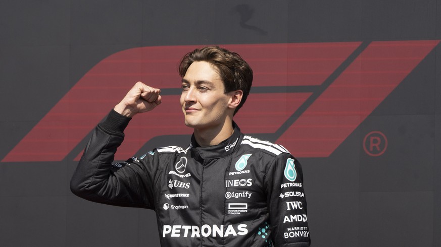 Mercedes driver George Russell, of the United Kingdom, celebrates his win during Formula One auto racing at the Canadian Grand Prix in Montreal, Sunday, June 15, 2025. (Christinne Muschi/The Canadian  ...
