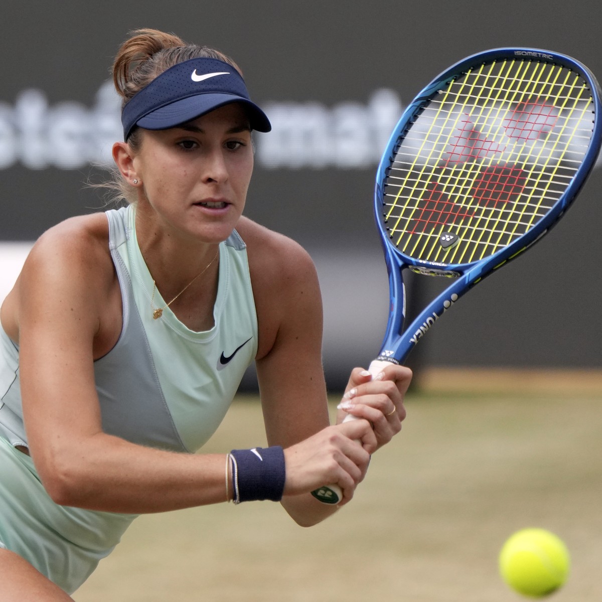 Belinda Bencic from Switzerland returns the ball to Ons Jabeur from Tunesia during the WTA tournament final tennis match in Berlin, Germany, Sunday, June 19, 2022. (AP Photo/Michael Sohn)