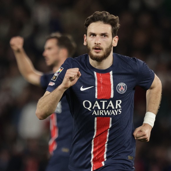 epa12110960 Khvicha Kvaratskhelia of Paris Saint Germain celebrates after scoring the 1-1 goal during the French Ligue 1 soccer match between Paris Saint-Germain and AJ Auxerre in Paris, France, 17 Ma ...