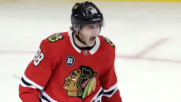 Chicago Blackhawks right wing Patrick Kane reacts after scoring a goal against the Detroit Red Wings during the third period of an NHL hockey game Sunday, Feb. 10, 2019, in Chicago. (AP Photo/Nam Y. H ...