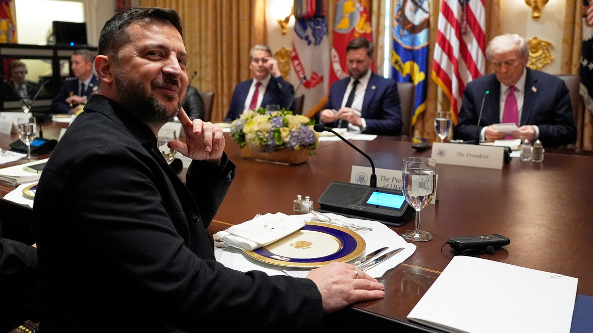 Ukraine's President Volodymyr Zelenskyy, left, sits before a meeting with President Donald Trump, from right, Vice President JD Vance and Treasury Secretary Scott Bessent in the Cabinet Room of t ...