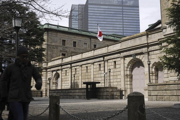 The headquarters of Bank of Japan (BOJ) is seen in Tokyo Tuesday, March 19, 2024. Japan?s central bank raised its benchmark interest rate Tuesday for the first time in 17 years, ending a longstanding  ...