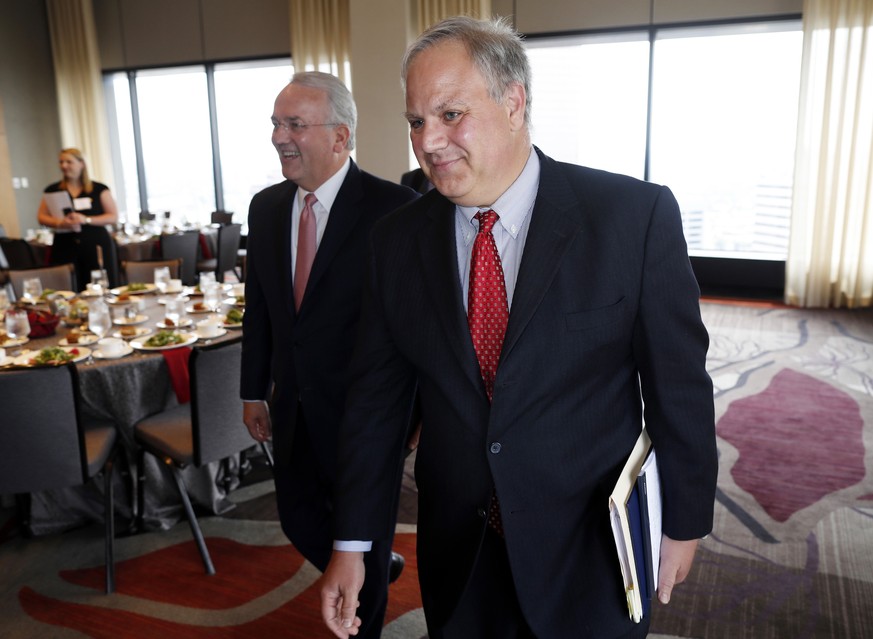 FILE - In this July 26, 2018 file photo, then- U.S. Deputy Secretary of the Interior David Bernhardt, foreground, and Jack Gerard, American Petroleum Institute president and chief executive officer, h ...