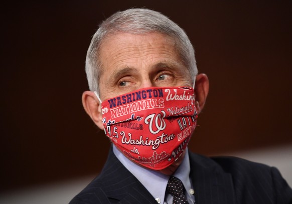 epa08518046 Dr. Anthony Fauci, director of the National Institute for Allergy and Infectious Diseases, prepares to testify before the Senate Health, Education, Labor and Pensions (HELP) Committee on C ...