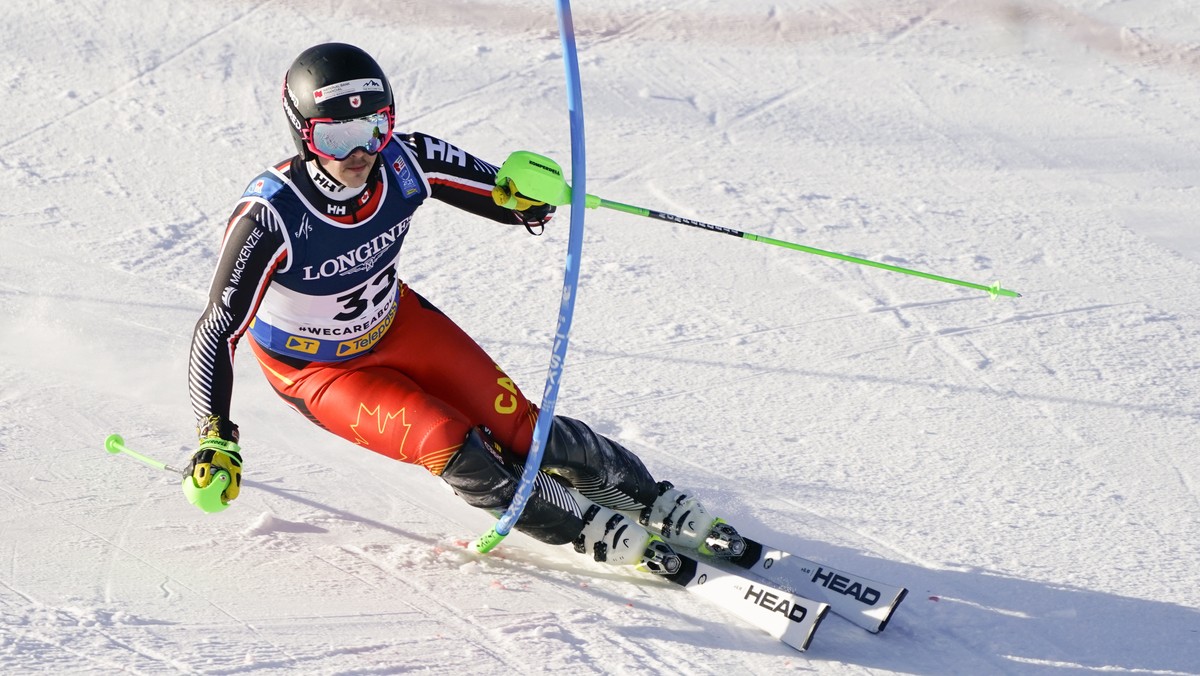 Canada's James Crawford competes in the slalom portion of the men's combined race, at the alpine ski World Championships, in Cortina d'Ampezzo, Italy, Monday, Feb. 15, 2021. (AP Photo/G ...