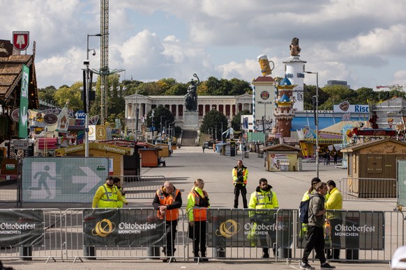 KEYPIX - epa12419984 The closed Oktoberfest grounds in Munich, Germany, 01 October 2025. The Oktoberfest grounds in Munich will remain closed until at least 5 p.m. local time on 01 October, following  ...