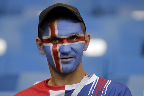 An Iceland fan sits on the stands prior to the start of the group D match between Iceland and Croatia, at the 2018 soccer World Cup in the Rostov Arena in Rostov-on-Don, Russia, Tuesday, June 26, 2018 ...