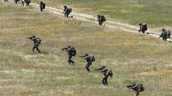 British soldiers from the 16 Air Assault Brigade take part in the Swift Response 22 military exercise at the Krivolak army training polygon in the central part of North Macedonia, on Thursday, May 12, ...