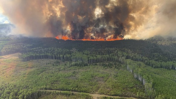 The Bald Mountain Wildfire burns in the Grande Prairie Forest Area on Friday, May 12, 2023 this handout image provided by the Government of Alberta. (Government of Alberta Fire Service/Canadian Press  ...