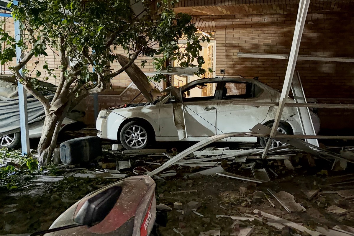 Debris surrounds a car at the site of what Iranian media said was a U.S. strike in Kuhestak, southern Iran, early Wednesday, Sept. 2, 2026. (Masoud Mohammadi/Tasnim News Agency via AP)
Iran US War