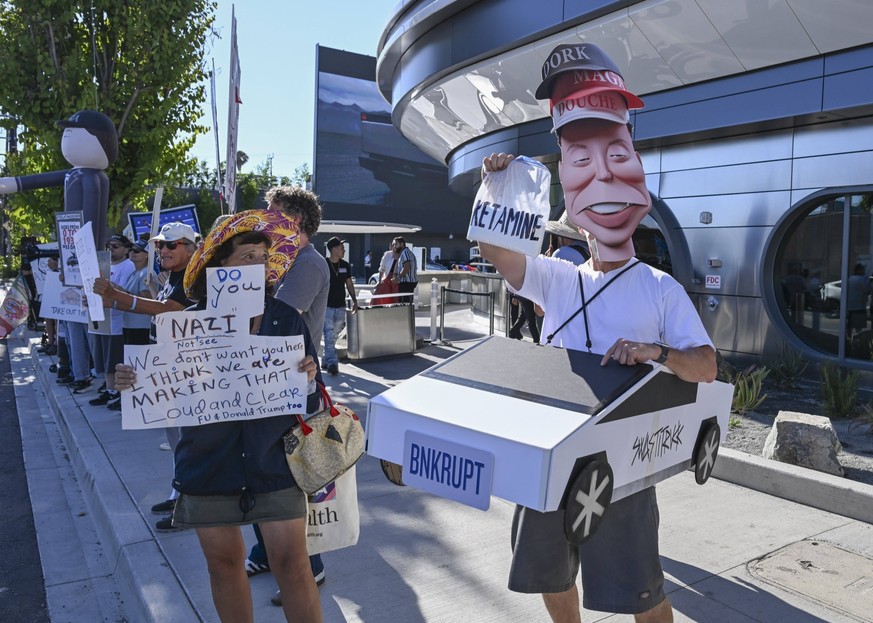 July 27, 2025, Hollywood, California, USA: Views of the Tesla Diner during the Tesla Takedown Protest. The Tesla Diner is a supercharging station, classic American diner and drive-in experience locate ...