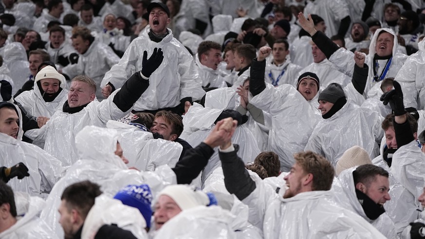 epa11025479 Danish fans react to FC Copenhagen scoring the 1-0 goal during the UEFA Champions League group A soccer match between FC Copenhagen and Galatasaray SK, in Copenhagen, Denmark, 12 December  ...