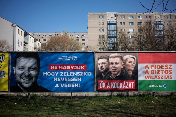 Campaign posters are displayed on the streets in Budapest, Hungary, on Saturday, March 14, 2026, ahead of the April 12 parliamentary election. (AP Photo/Denes Erdos)
Hungary Election