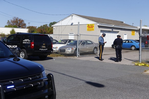 Police investigate the scene of a shooting in Wilmington, Del., on Wednesday, Oct. 18, 2017. Radee Labeeb Prince, wanted in the shooting of several people at his workplace in Maryland is now suspected ...