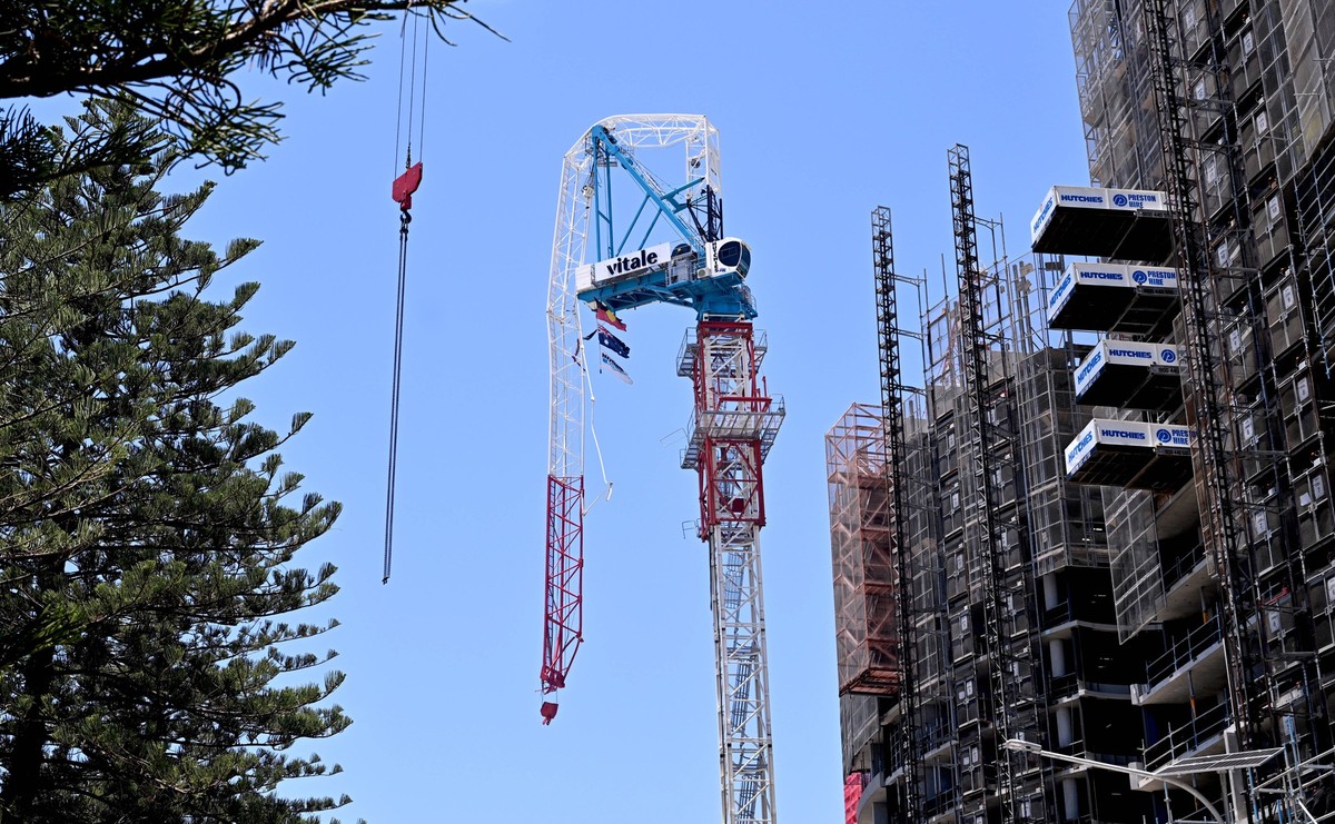 THUNDERSTORM GOLD COAST, A crane is seen snapped at the Mondrian Towers development site at Burleigh Heads on the Gold Coast Tuesday, December 26, 2023. A woman struck by a tree has died after storm w ...