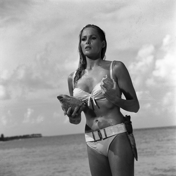 This undated publicity photo provided by United Artists and Danjaq, LLC shows Ursula Andress in a scene from the James Bond 1962 film, "Dr. No." When Ursula Andress emerged from the sea, cur ...