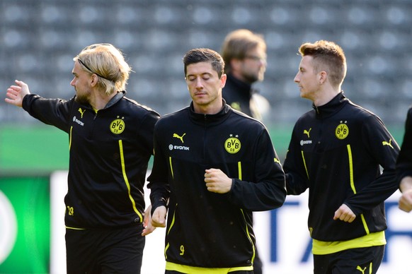 Robert Lewandowski (Mitte): Schiesst er in seinem letzten Spiel für Dortmund die neuen Kollegen von Bayern München ab?