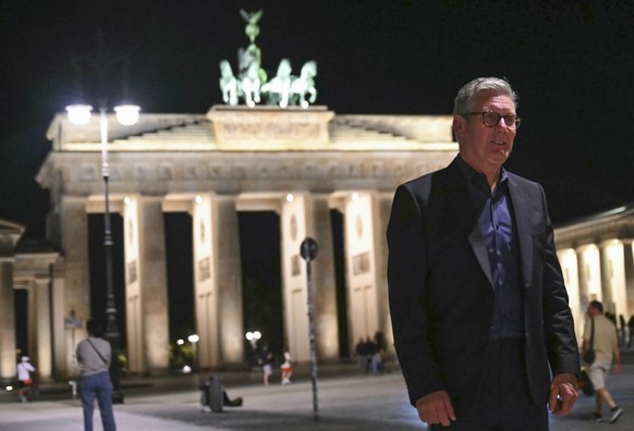 Britain&#039;s Prime Minister Keir Starmer walks near the Brandenburg Gate in Berlin, on Tuesday, Aug. 27, 2024. (Justin Tallis/Pool Photo via AP)
Keir Starmer
