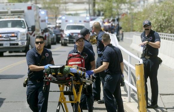 El Paso Fire Medical personnel arrive at the scene of a shooting at a Walmart near the Cielo Vista Mall in El Paso, Texas, Saturday, Aug. 3, 2019. (Mark Lambie/The El Paso Times via AP)