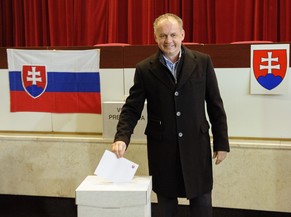 Candidate Andrej Kiska casts his ballot for the Slovak presidential election in Poprad, 300 kilometres (186 miles)  northeast of Bratislava, on Saturday, March 15, 2014. Slovak citizens are choosing among 14 candidates to succeed Ivan Gasparovic in a largely ceremonial post. The 51-year-old successful businessman-turned philanthropist Kiska is Prime Minister's Robert Fico's major challenger. (AP Photo/CTK, Tomas Halasz) SLOVAKIA OUT