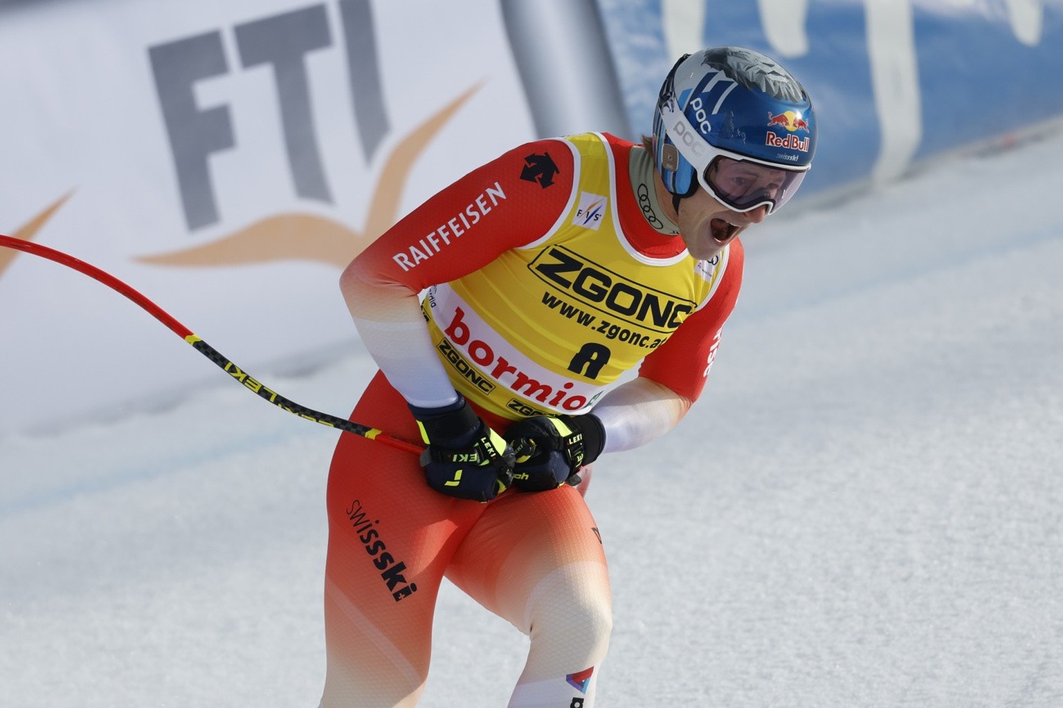 Switzerland&#039;s Marco Odermatt celebrates at the finish area of an alpine ski, men&#039;s World Cup downhill race, in Bormio, Italy, Thursday, Dec. 28, 2023. (AP Photo/Alessandro Trovati)