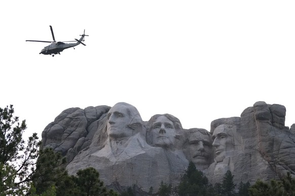 Marine One, with President Donald Trump aboard, passes Mount Rushmore National Memorial, Friday, July 3, 2026, near Keystone, S.D. (AP Photo/Alex Brandon)
Donald Trump