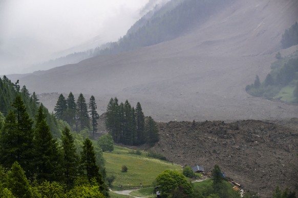 epa12141193 An avalanche from the Birch glacier covers buildings in Blatten, Switzerland, 28 May 2025. A number of houses were destroyed in the village of Blatten, but no casualties have been reported ...
