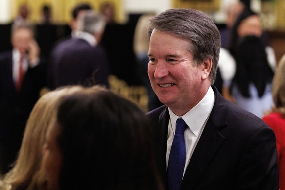 epa12984678 US Supreme Court Associate Justice Brett Kavanaugh looks on after the swearing-in ceremony of Kevin Walsh as the chair of the Federal Reserve, conducted at the White House in Washington, D ...