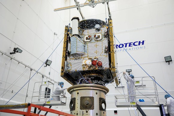 Syndication: USA TODAY Technicians last week connect the Psyche spacecraft to the payload attach fitting inside the clean room at Astrotech Space Operations facility in Florida. Scientists believe the ...