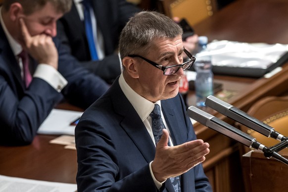 epa07184015 Czech Prime Minister Andrej Babis delivers a speech as he attends a no-confidence vote within a session in the Czech Parliament in Prague, Czech Republic, 23 November 2018. According to re ...