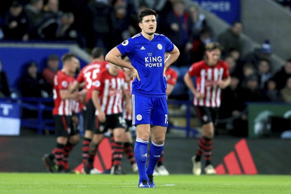 Leicester City's Harry Maguire appears dejected as Southampton score their second goal of the game during the English Premier League soccer match between Leicester City and Southampton at the King Pow ...