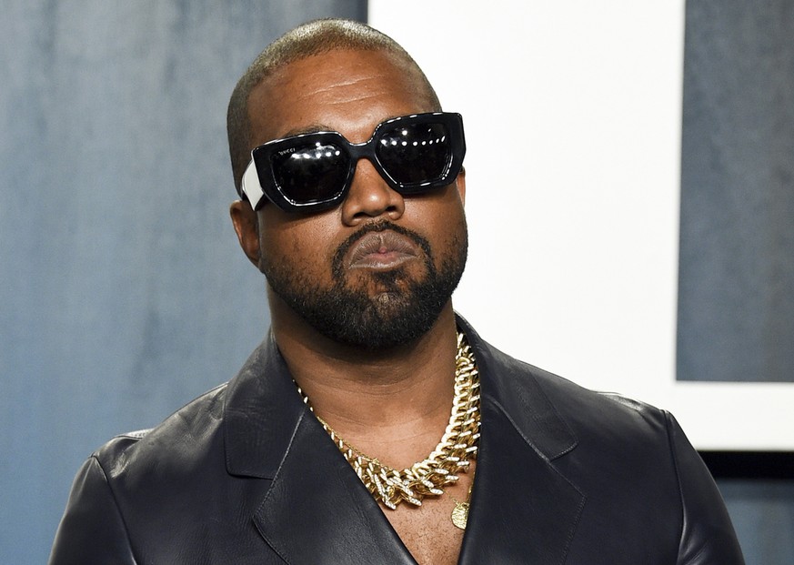 FILE - Kanye West arrives at the Vanity Fair Oscar Party on Feb. 9, 2020, in Beverly Hills, Calif. The rapper formerly known as Kanye West is offering to buy right-wing friendly social network Parler  ...