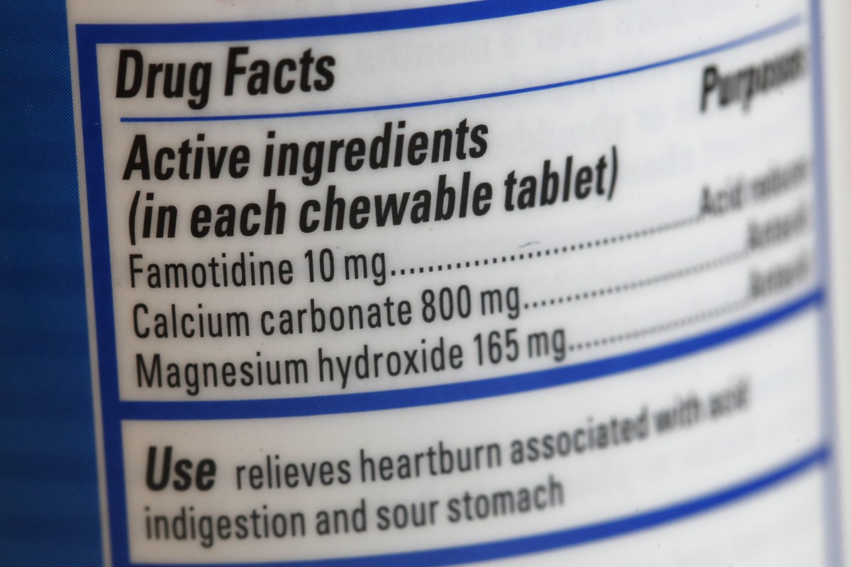 This June 15, 2020 photo shows a Pepcid antacid label listing the active ingredient famotidine in Washington. The U.S. government's Pepcid project has revealed what critics describe as the Trump  ...