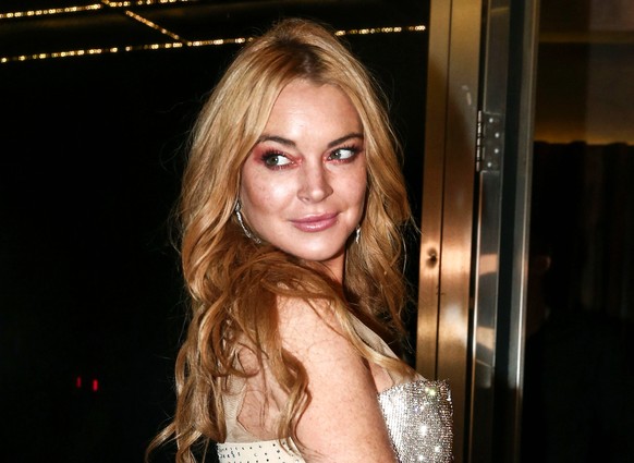FILE - Actress Lindsay Lohan appears at the opening night of the Lohan Nightclub in Athens, Greece, Oct. 16, 2016. Lohan has told her followers on Instagram that she&#039;s engaged to boyfriend Bader  ...