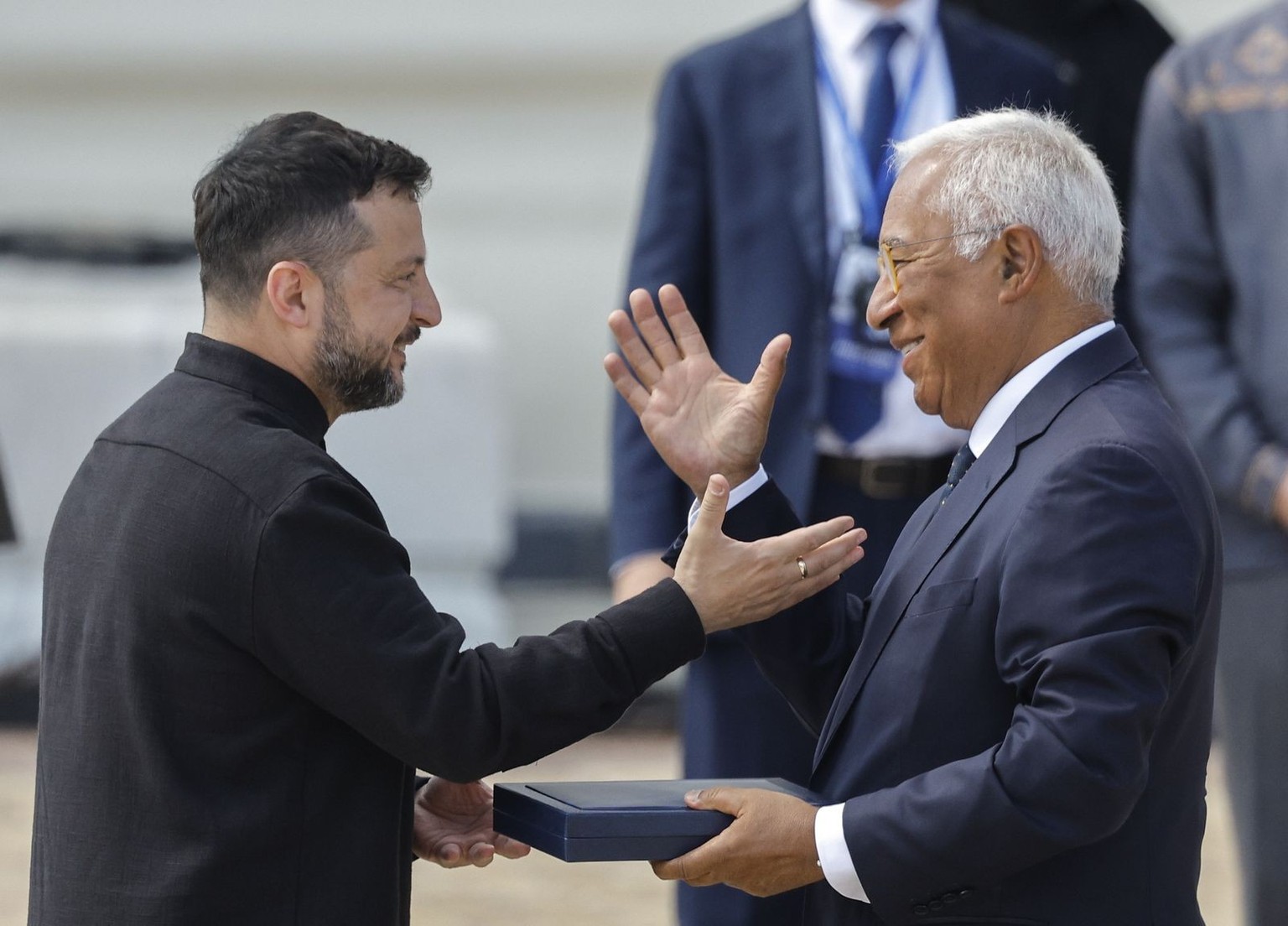 epa13188709 Ukrainian President Volodymyr Zelensky (L) hands an award to President of the European Council Antonio Costa during an event marking Ukraine's Independence Day near the St. Sophia Cat ...