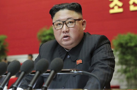 FILE - In this Jan. 8, 2021, file photo provided by the North Korean government, North Korean leader Kim Jong Un speaks at the ruling party congress in Pyongyang, North Korea. Last year was a disaster ...