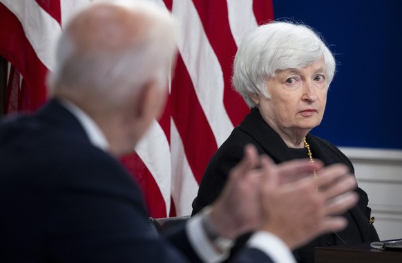 epa09509612 US President Joe Biden speaks in front of US Treasury Secretary Janet Yellen (Back) during a meeting with members of his administration and business leaders and CEOs on the need to address ...