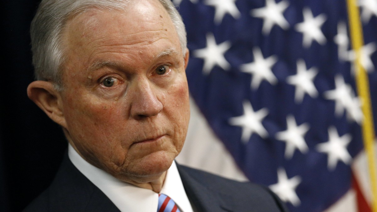 Attorney General Jeff Sessions listens to a reporter's question during a news conference in Baltimore, Tuesday, Dec. 12, 2017, to announce efforts to combat the MS-13 street gang with law enforce ...