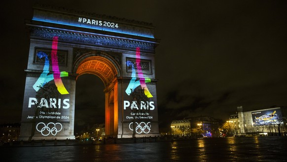 epa06119009 (FILE) - The Arc de Triomphe displays the 2024 Paris olympics logo in Paris, France, 09 February 2016 (reissued 31 July 2017). Paris and Los Angeles were the only two cities to reach the f ...