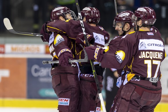 Les joueurs genevois, laissent eclater leur joie, lors du 6eme match du quart de finale de play off du championnat suisse de hockey sur glace de National League, entre le Geneve Servette HC et le SC B ...