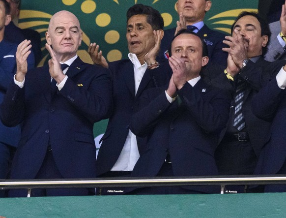 June 30, 2026, Peru: L-R CONMEBOL President Alejandro Dominguez, FIFA President Gianni Infantino and Mexican Football Federation Mikel Arriola PeoÂalosa applaud prior to the during the FIFA World Cup, ...